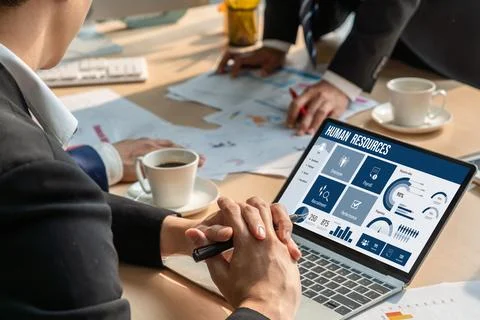 Human resources software on computer screen help employee manage people snugly Stock Photos