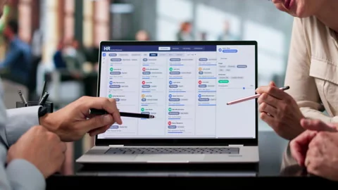 Human Resources Team Collaborating On Candidate Scheduling Stock Footage 337630448