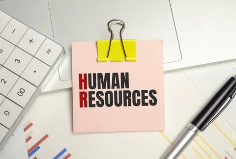 Human resources word on sticker on notepad with pen and calculator Stock Photos