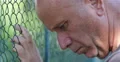Human Rights Protection Camp Metallic Fence Close Up Depressed Person Portrait 4k or 4k+ Resolution