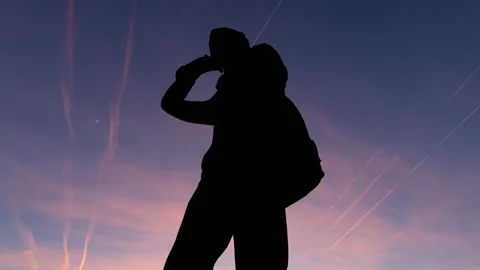 Human Silhouette Activity Under Bright Clear Sky Stock Footage 329082830