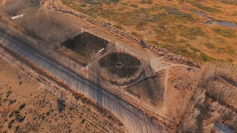 Human size geometric hedge mazes in Malargue, Argentina. High aerial view on Stock Footage 332955819