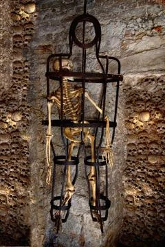 Human skeleton trapped in a cage Stock Photos