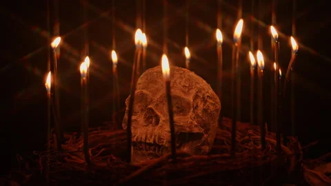 Human skull and black magic candles spirituality setup. Mystic and occult e.. Stock Footage 345456432