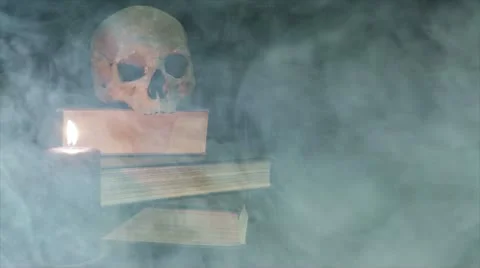 Human skull and voodoo doll in the smoke Stock Footage 20530230