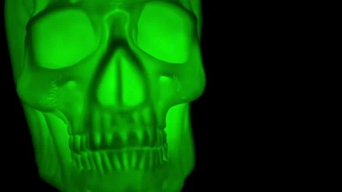 Human Skull glowing different colors against black backdrop Stock Footage 250465397