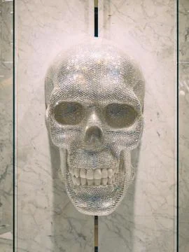 Human skull made of crystals. Elements of decor in the clothing Stock Photos