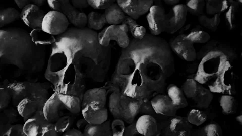 Human Skulls and Bones arranged in rows in Catacombs Stock Footage 309400168