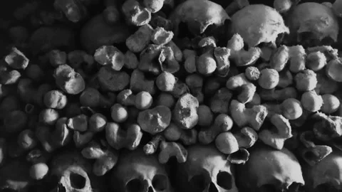Human Skulls and Bones arranged in rows in Catacombs Video stock 309400187