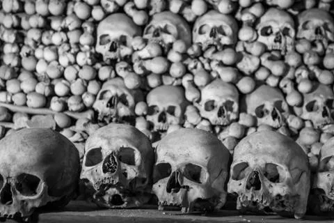 Human skulls and bones. Gothic vault. mass grave. Texture. Kostnice in Kutna Stock Photos
