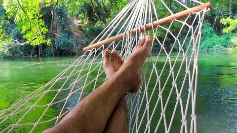 Human sleep in rope swing Stock Footage 85425741