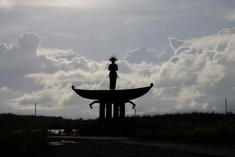 Human statue on the boat Stock Photos