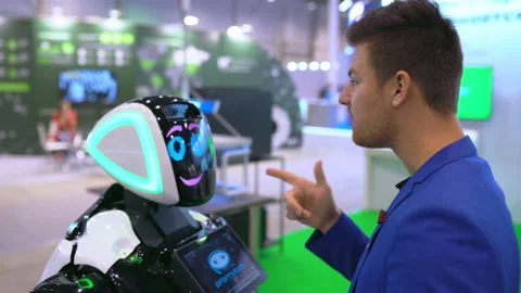 Human talking with artificial intelligence robot for learning knowledge college. Stock Footage 139316477