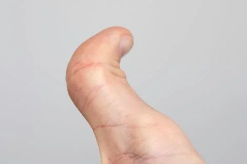 Human thumb close up on white background 스톡 사진