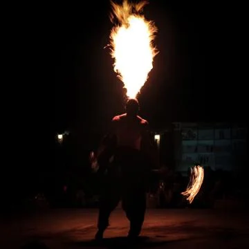 Human Touch Spitting Fire. Fire Dancer Performing at Desert Safari, Dubai, UAE Stock Photos