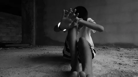 Human trafficking. ,Stop abusing violence.,The boy tied with a rope. Video stock 82627537