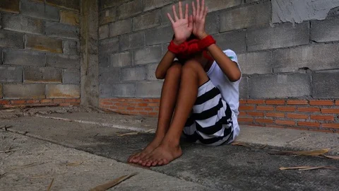 Human trafficking. ,Stop abusing violence.,The boy tied with a rope. Stock Footage 82628142