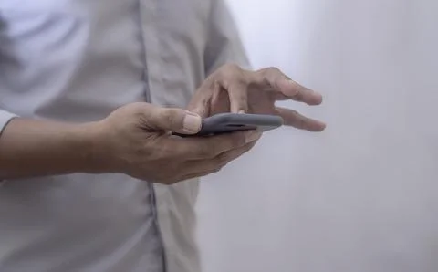 Human using smart phone mobile Stock Photos