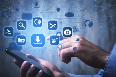Human using smartphone. App icons with a download symbol. Development of ap.. Stock Photos