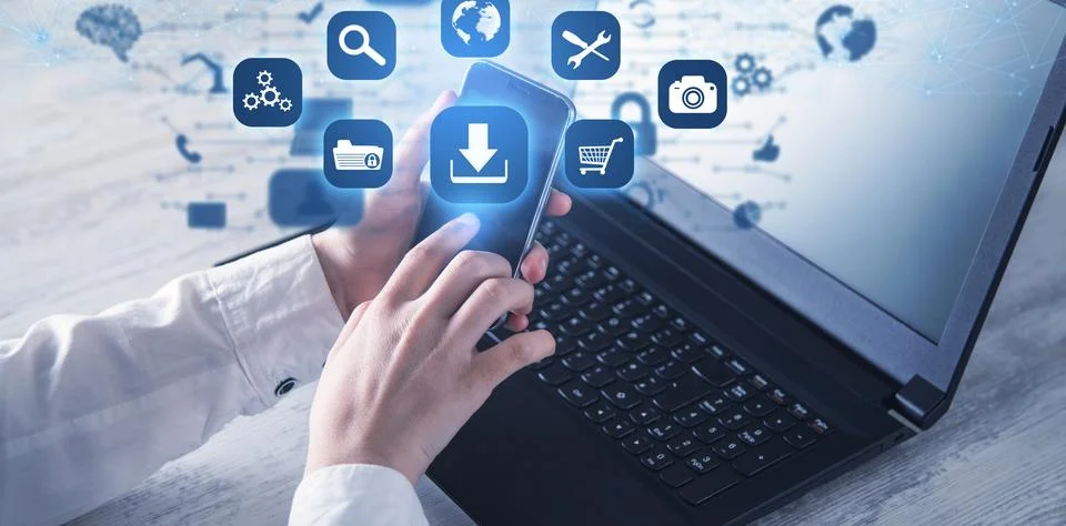Human using smartphone. App icons with a download symbol. Development of ap.. Stock Photos