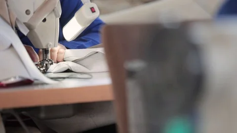 A human working on the sewing machine Stock Footage 115697512