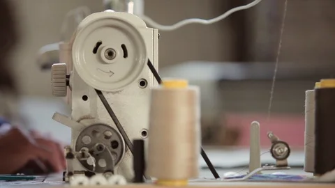 A human working on the sewing machine Stock Footage 115698514