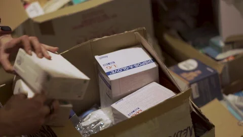 Humanitarian aid in a boxes in a basement of house during war in Ukraine Stock Footage 172418943