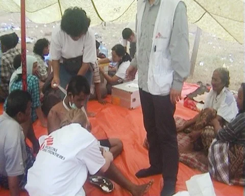 Humanitarian Aid Workers in Banda Aceh, several days of the 2004 tsunami Stock Footage 125533978