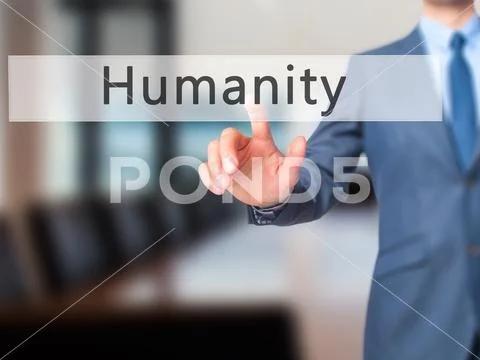 Humanity - Businessman hand pressing button on touch screen inte Stock Photos