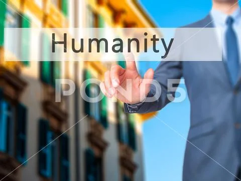 Humanity - Businessman hand pressing button on touch screen inte Stock Photos