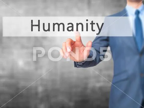 Humanity - Businessman hand pressing button on touch screen inte Stock Photos