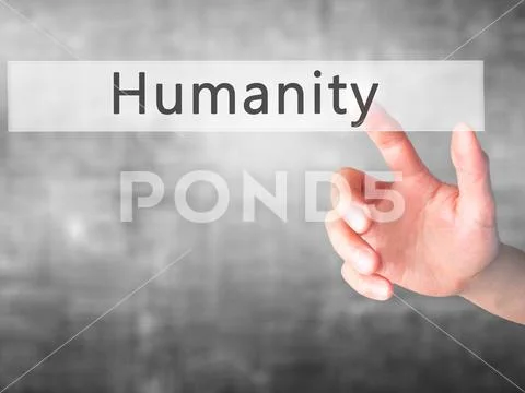 Humanity - Hand pressing a button on blurred background concept Stock Photos