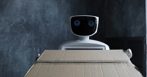 Humanoid autonomous robot with cardboard box in hand. Cybernetic system today Vídeo Stock 97968158