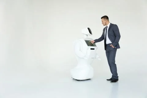 Humanoid autonomous robot with stylish man in a suit. Modern Robotic Stock Photos