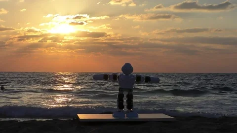 Humanoid autonomous smart Robot looks at swimmer skinny diver in sea waves Stock Footage
