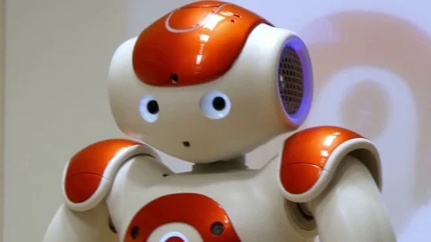 Humanoid red nao robot moving Stock Footage 70234232