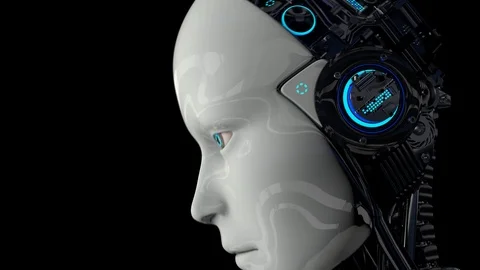 A humanoid robot on a black background turns on and raises its head. The camera Video stock 126350541