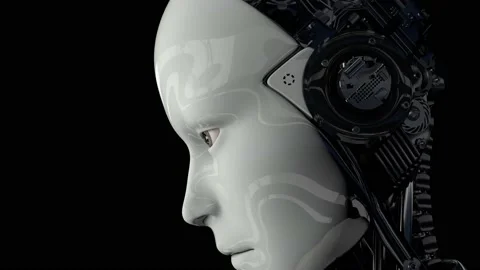 A humanoid robot on a black background turns on and raises its head. Static Stock Footage 134069584