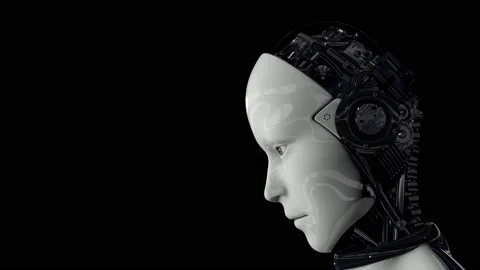 A humanoid robot on a black background turns on and raises its head. Static Stock Footage 134069619