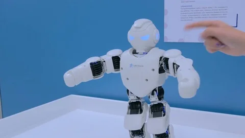 Humanoid robot dancing. Robot dance show Stock Footage 79548281