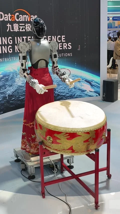 Humanoid robot perform music at a technology exhibition Stock-Footage 338319399