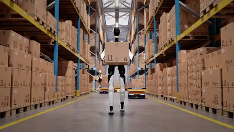 Humanoid robot worker walking with cardboard box in automated warehouse Stock Footage 329178008