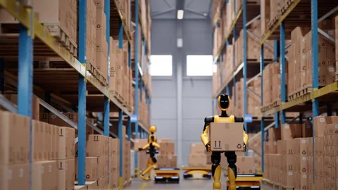 Humanoid robot worker walking with cardboard box in automated warehouse Stock Footage 329510539