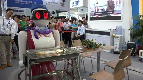 Humanoid robots function as waitresses in restaurant, trade show China 스톡 동영상 67548467