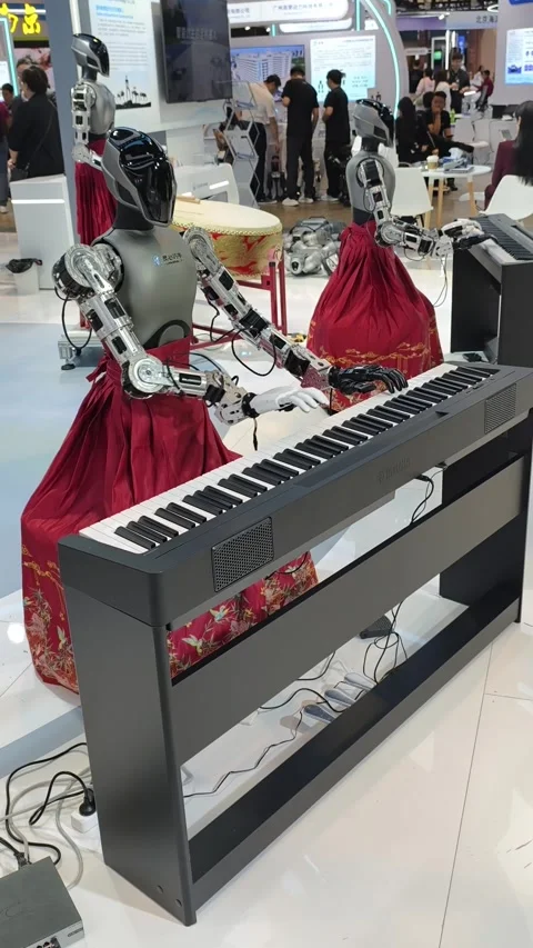Humanoid robots perform music Stock-Footage 338319597