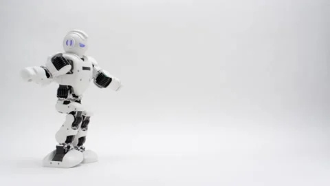 Humanoid white robot dancing on white background Stock Footage 169815432