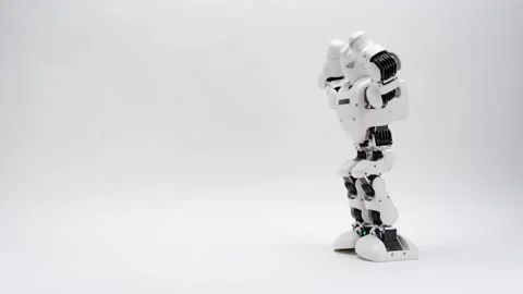 Humanoid white robot dancing on white background Stock Footage 169815514