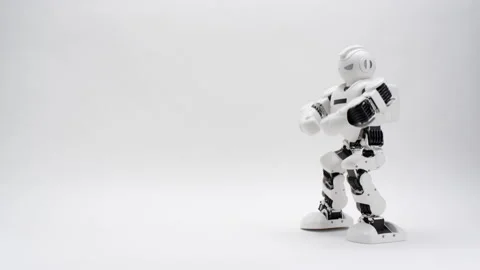 Humanoid white robot dancing on white background Stock Footage 169815563