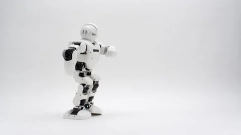 Humanoid white robot working out on white background Stock Footage 169815398
