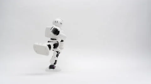 Humanoid white robot working out on white background Stock Footage 169815608